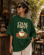 Woman wearing REBELO Chai First bottle green oversized graphic T-shirt