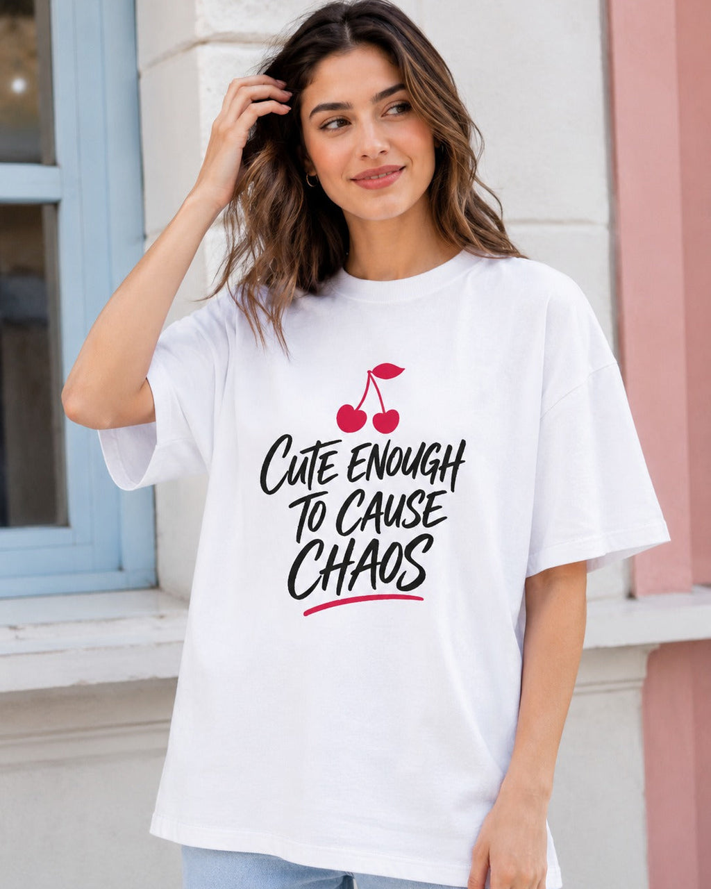 Model wearing Cute Enough to Cause Chaos oversized T-shirt in white
