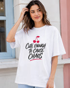 Model wearing Cute Enough to Cause Chaos oversized T-shirt in white