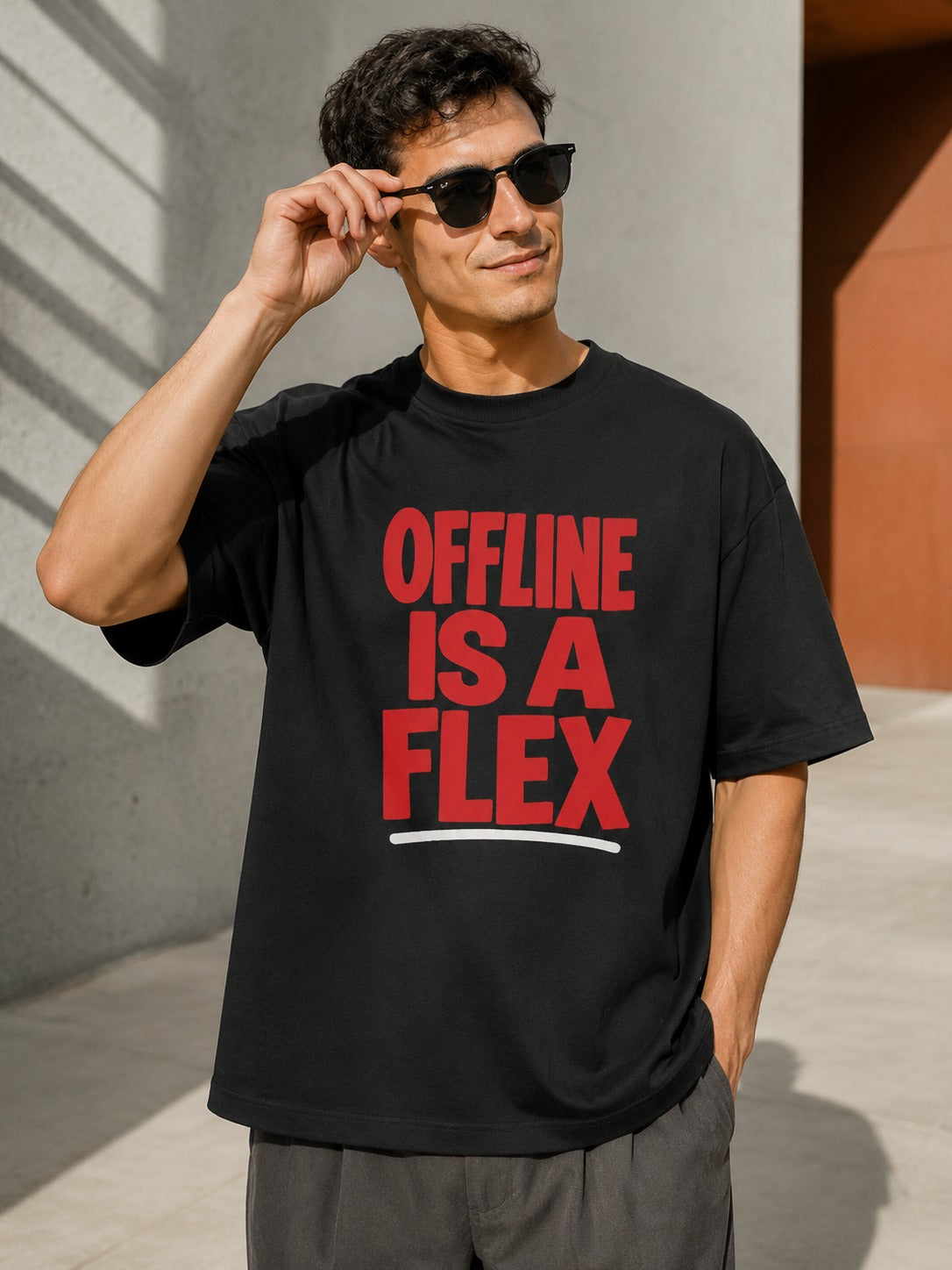 Model wearing Offline Is a Flex oversized T-shirt in black