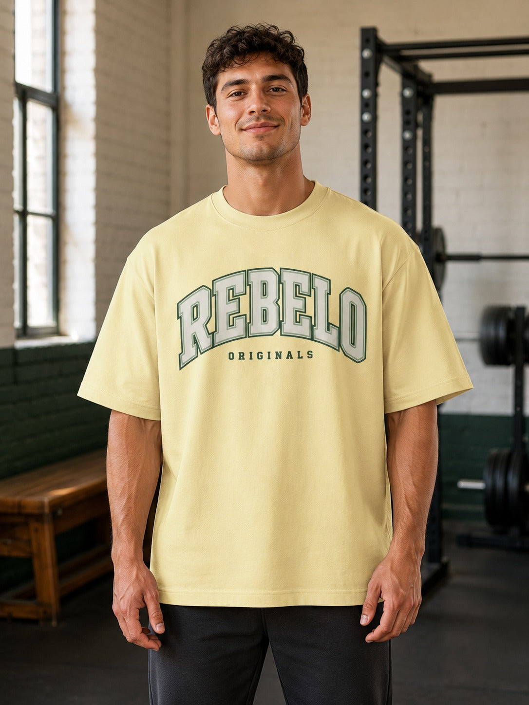 Model wearing REBELO Originals oversized T-shirt in beige