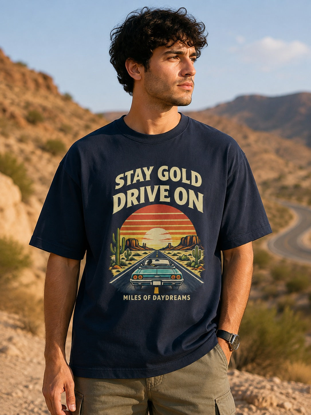 Model wearing Stay Gold Drive On oversized T-shirt in navy blue
