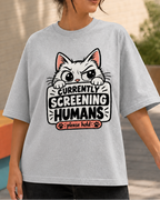 Model wearing Currently Screening Humans oversized T-shirt in Grey Melange