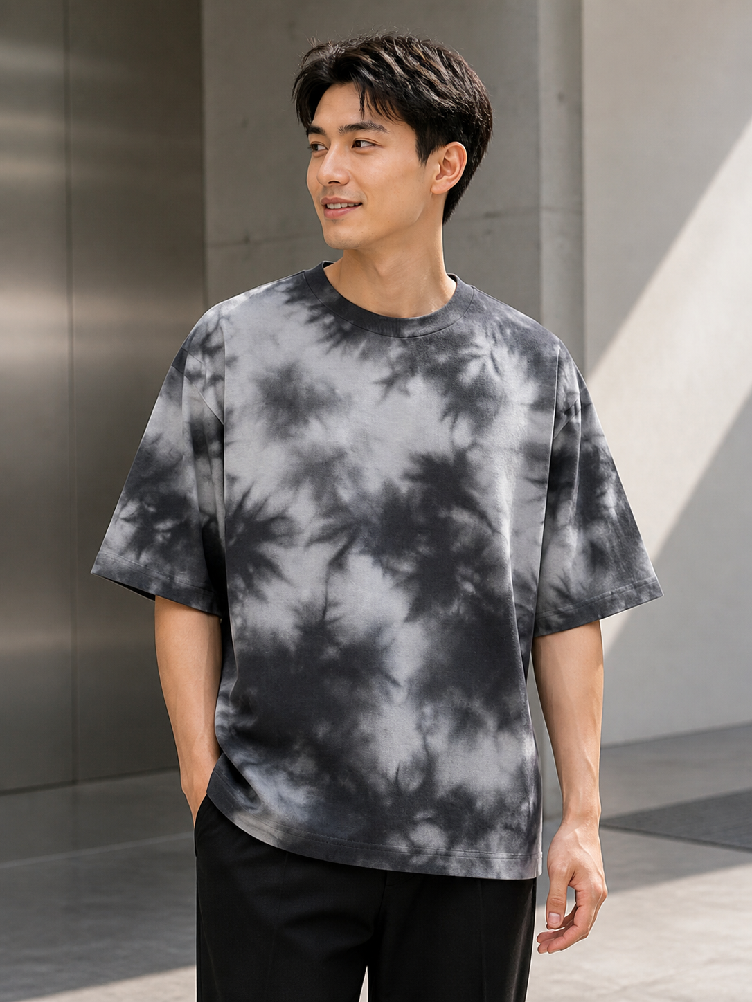 Model wearing 260 GSM tie-dye oversized T-shirt in White Black